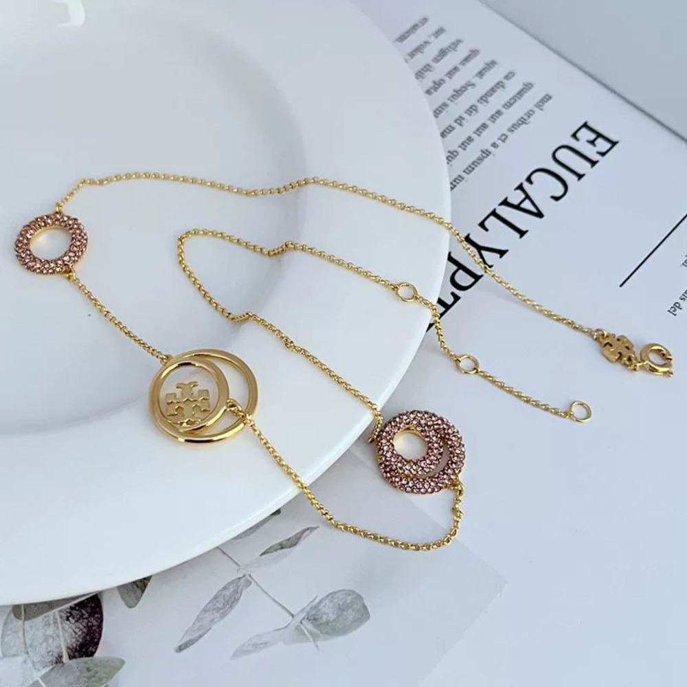Tory Burch Rhinestone Geometric Round Necklace - Picture 2 of 7